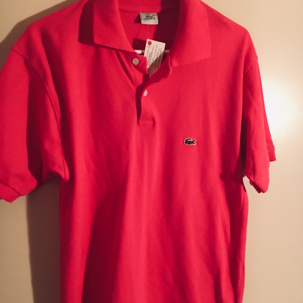Young man Lacoste shirt in hot pink